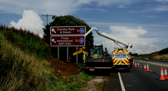 Installing road sign on motorway – highway sign installations