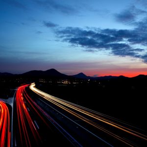 High speed traffic management at night with car light trails